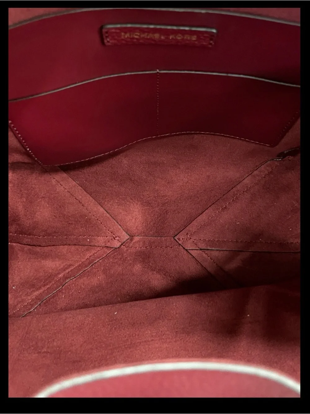 MICHAEL Michael Kors Junie Red Pebbled Leather Drawstring Backpack